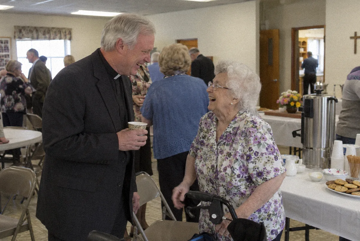 Pastor Bill with her at coffee hour